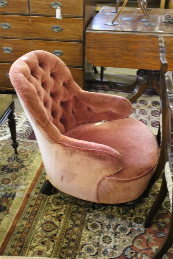 Victorian easy chair upholstered in rose pink buttoned velvet